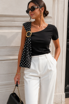Becca Black Polka Dot Asymmetrical Top