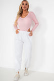Gabby Pink Knit Long Sleeve Bodysuit