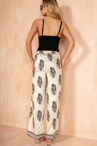 Holly Cream Border Print Wide Leg Trousers