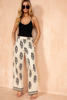 Holly Cream Border Print Wide Leg Trousers
