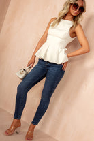 Khloe Stone Bow Back Peplum Top
