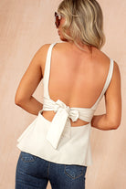 Khloe Stone Bow Back Peplum Top