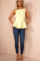 Khloe Yellow Bow Back Peplum Top