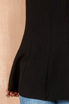 Loretta Black Sleeveless Peplum Top