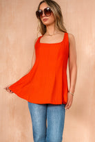 Loretta Orange Sleeveless Peplum Top