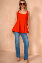 Loretta Orange Sleeveless Peplum Top