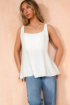 Loretta White Sleeveless Peplum Top